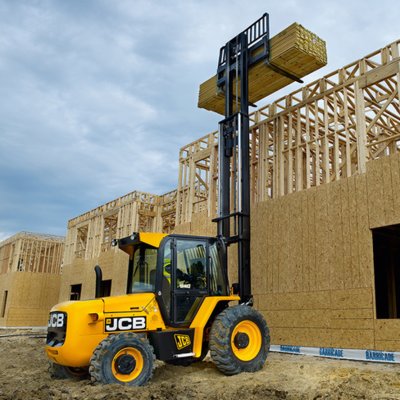 Forklift unloading machinery and industrial equipment in Reading